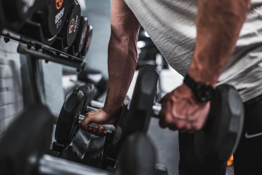 A rack of dumbbells on the Optimum training floor